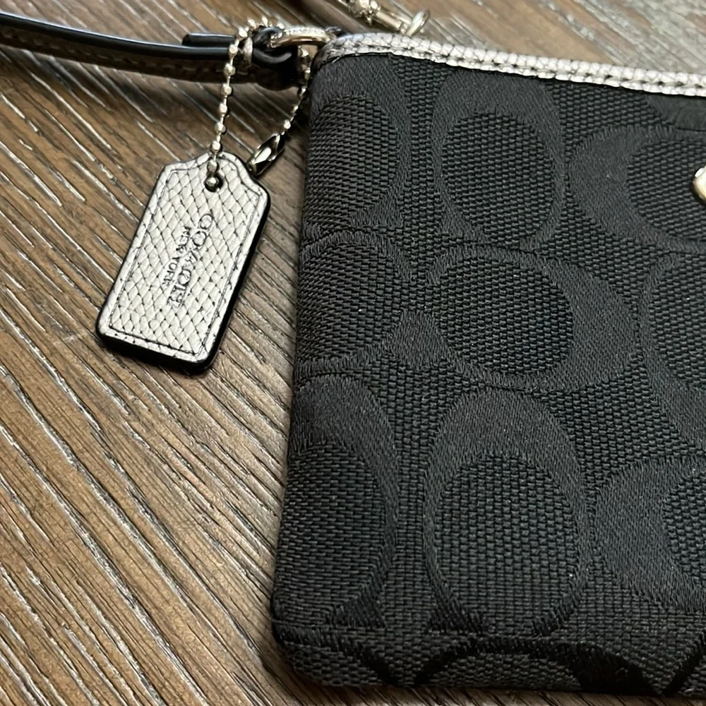 Coach black signature silver metallic leather edge wristlet